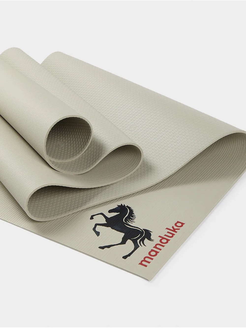 Manduka Yoga Mat in Light Beige with Fire horse logo